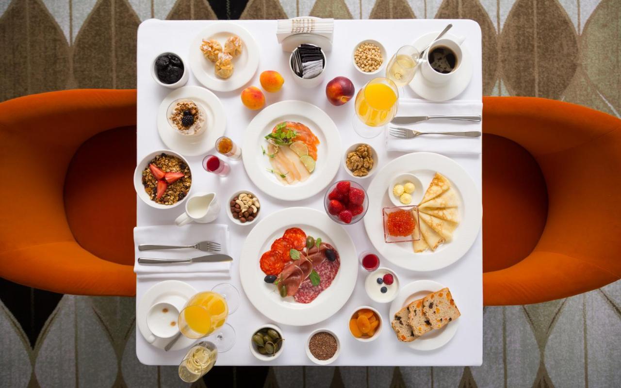 Lotte Hotel سامارا المظهر الخارجي الصورة A typical breakfast at the hotel