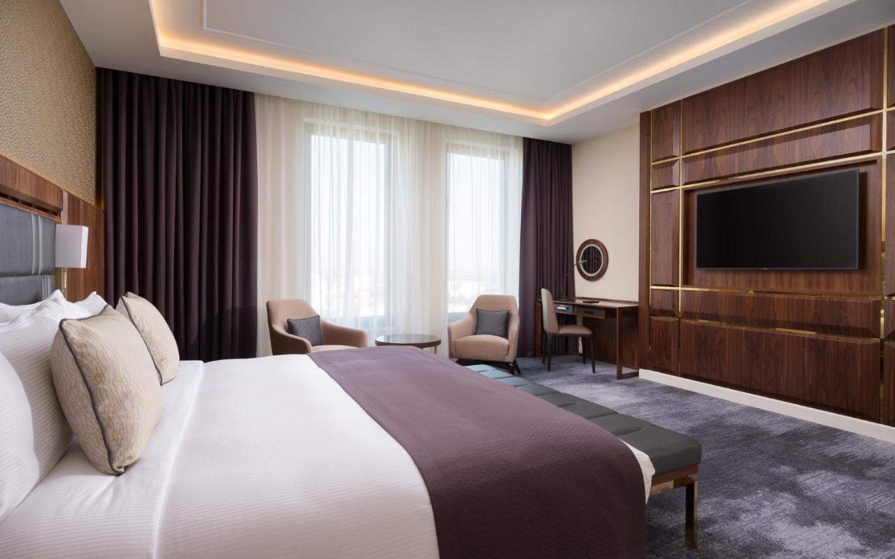 Lotte Hotel سامارا المظهر الخارجي الصورة A bedroom at the hotel