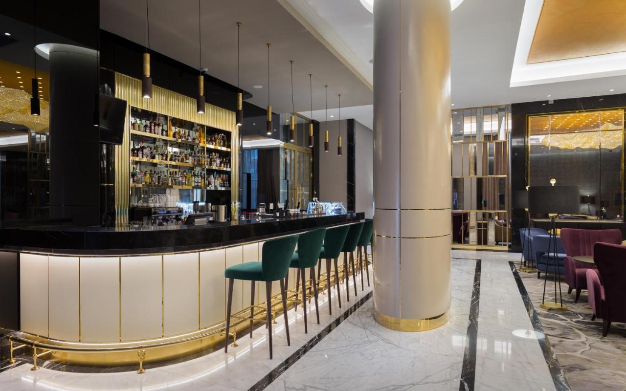 Lotte Hotel سامارا المظهر الخارجي الصورة The bar at the hotel